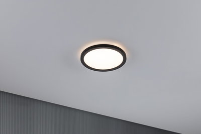 Round LED ceiling light with black metal frame and warm white light for modern interiors