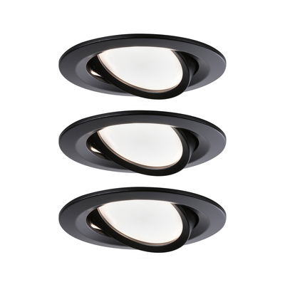 Three black recessed spotlights with white light and adjustable tilt for modern indoor lighting