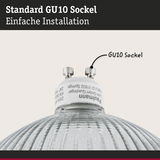 Nahaufnahme einer GU10 Fassung mit weißem Sockel und geriffeltem Glas für LED-Lampen