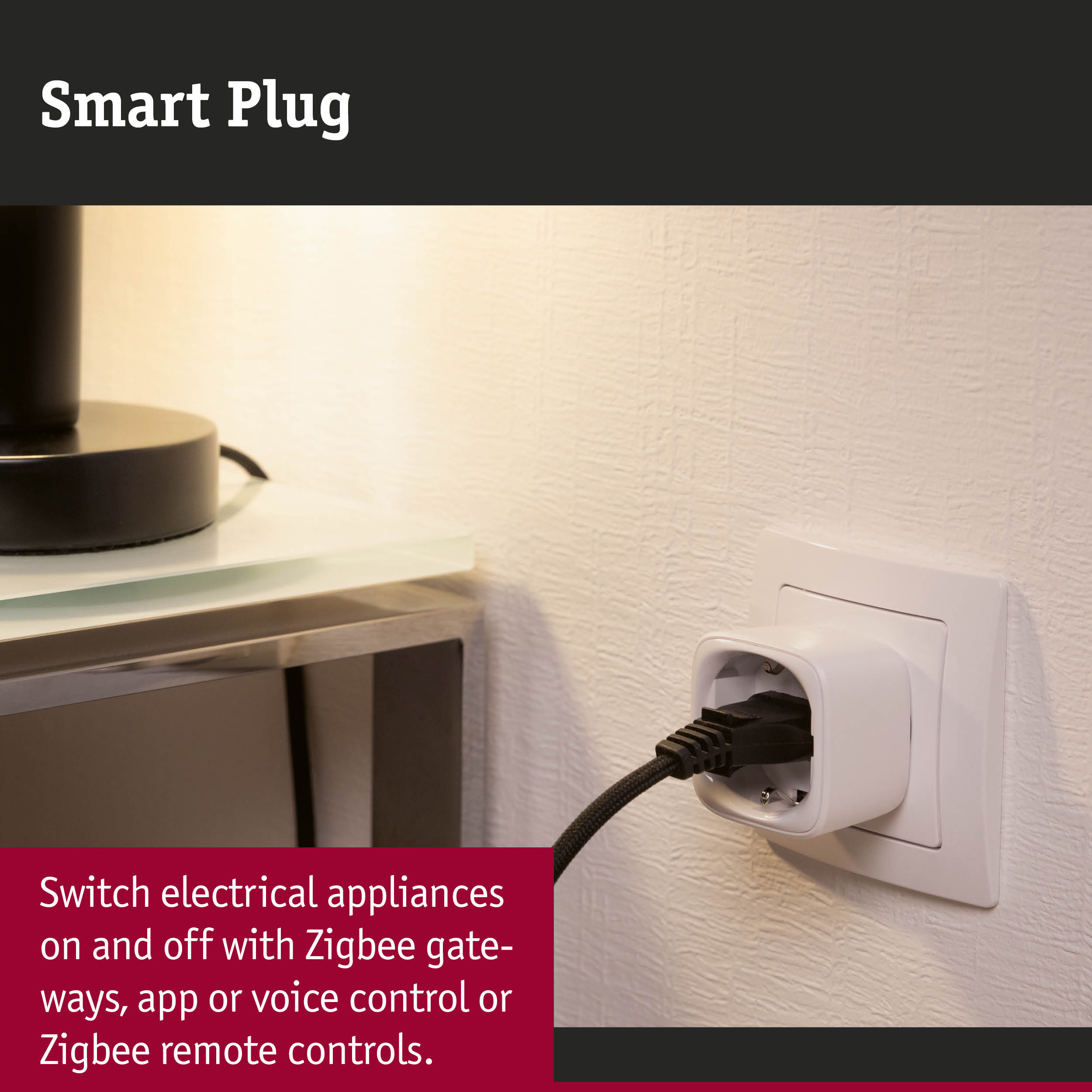 White smart plug in socket with black cable for Zigbee control of electrical appliances