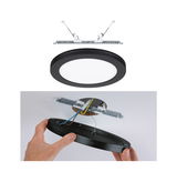 Black LED recessed light with white diffuser and metal bracket, ceiling installation with cable connection