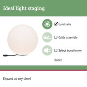 Round white luminaire with black cable for light staging, perfect for indoor lighting and decoration