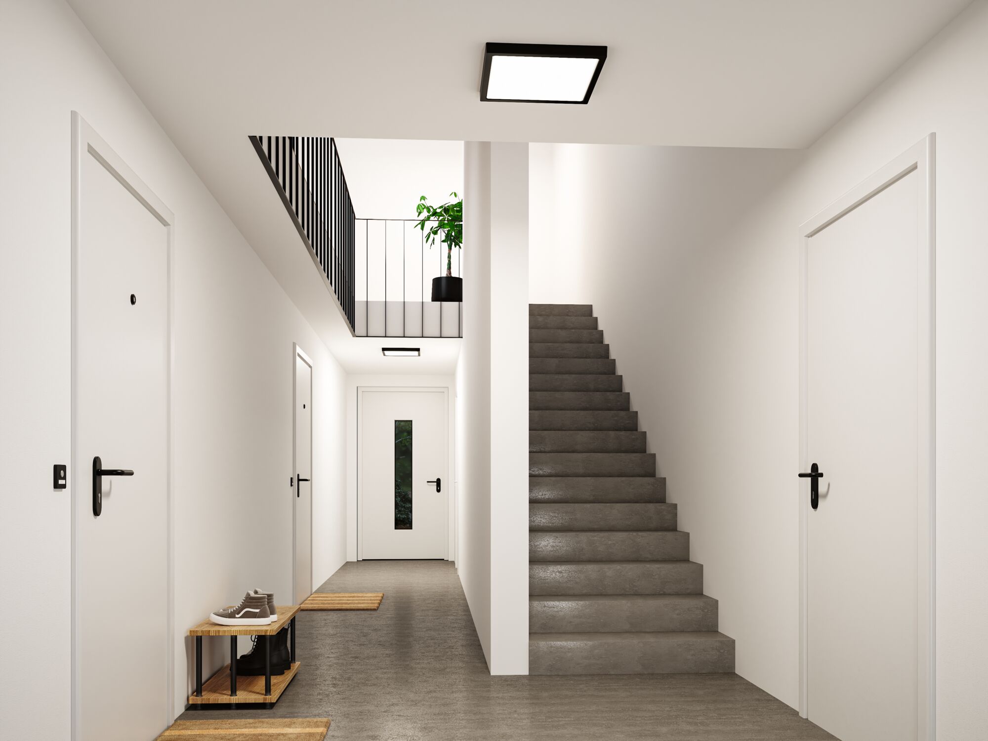 Modernes Treppenhaus mit grauem Betonboden, weißen Türen und quadratischer Deckenleuchte in Schwarz
