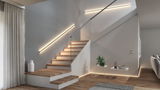 Modern staircase with wooden steps and warm white LED wall lights for stylish indoor lighting design