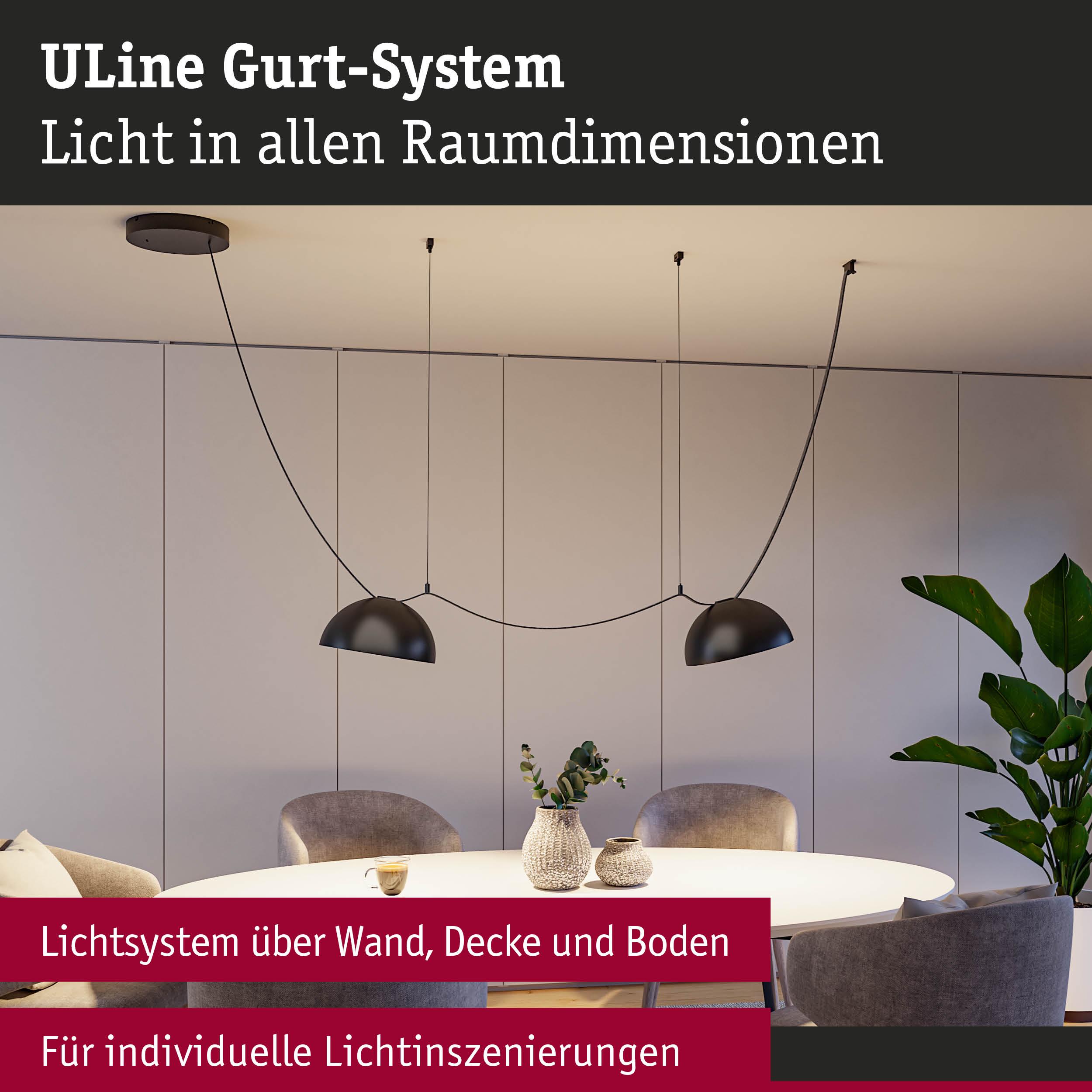 Modernes ULine Gurt-System mit schwarzen Hängeleuchten über rundem Tisch für individuelle Lichtgestaltung