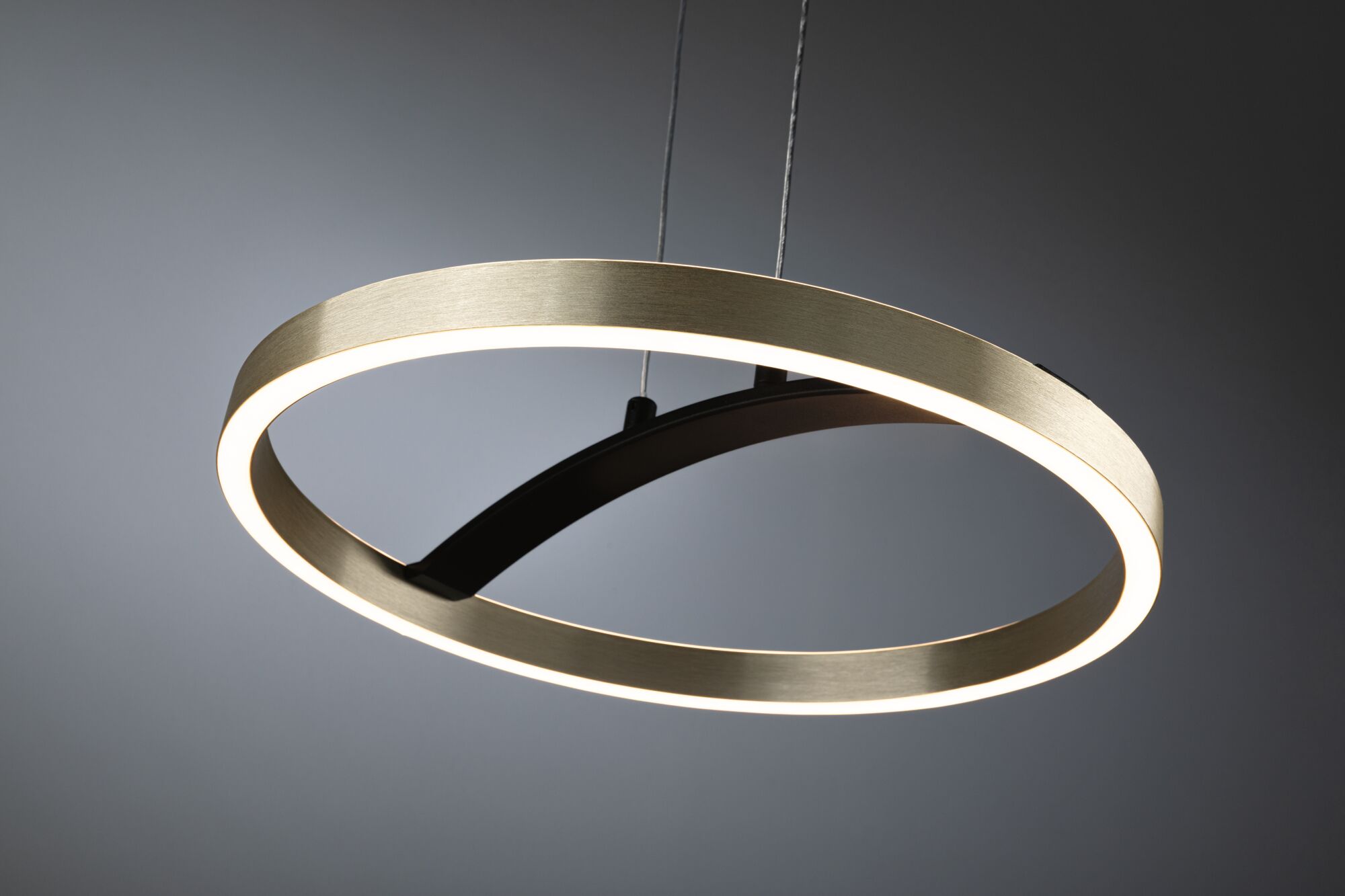 Modern LED ring pendant light in brushed gold metal with warm white illumination for living spaces