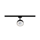 Black LED spotlight with round white diffuser on track system for modern indoor lighting