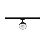 Black LED spotlight with round white diffuser on track system for modern indoor lighting
