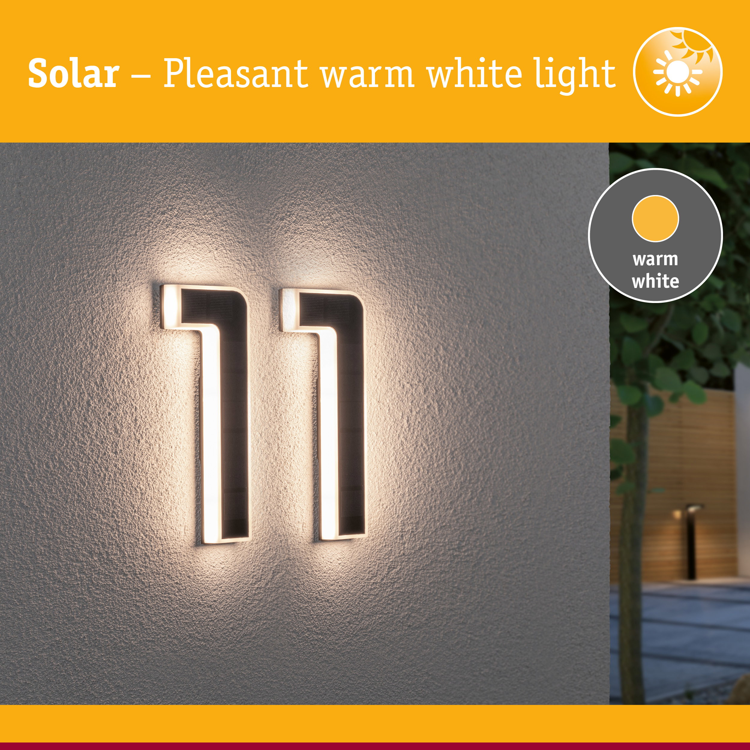 Solar-powered house number light with warm white illumination and black frame for outdoor use
