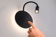 Black LED wall light with flexible reading arm and touch switch, modern design for living spaces