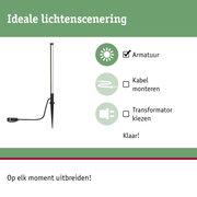 Zwarte LED-tuinfakkel met grondpin en kabel voor flexibele buitenverlichting.
