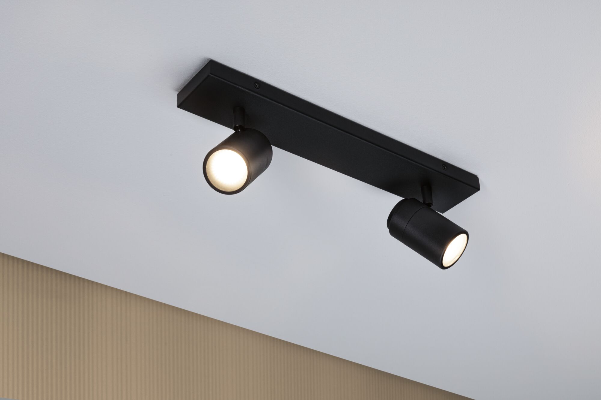 Black metal LED ceiling light with two adjustable spotlights for modern room lighting