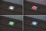 Quatre spots LED encastrés au sol carrés blancs avec couleurs changeantes rouge, vert, bleu et blanc chaud.