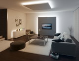 Moderne stue med grå sofa, beige lænestol, hvidt tæppe og indirekte LED-loftsbelysning