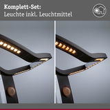 Schwarze LED-Leuchte mit Bewegungsmelder und warmweißem Licht, modernes Design für Innenräume