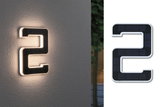 Solar-powered house number 2 with white frame and black surface, modern LED outdoor wall light