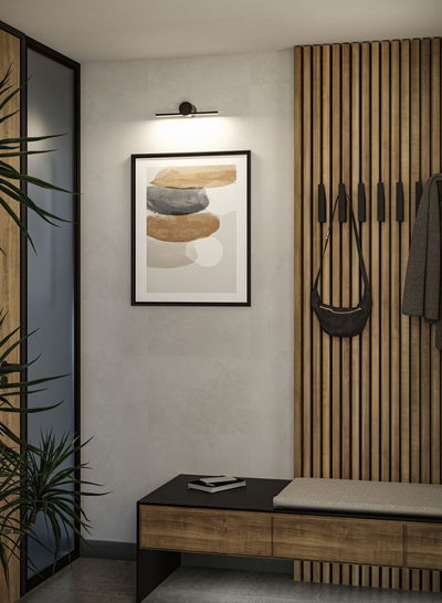 Modern hallway with wooden bench, wall panels and black LED picture light for home lighting