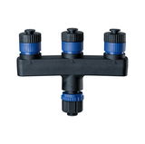 Black plastic connector with blue screw caps for electrical wiring and connections