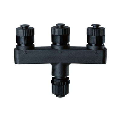 Sort plastikfordeler med blå skruelåg til elektriske forbindelser