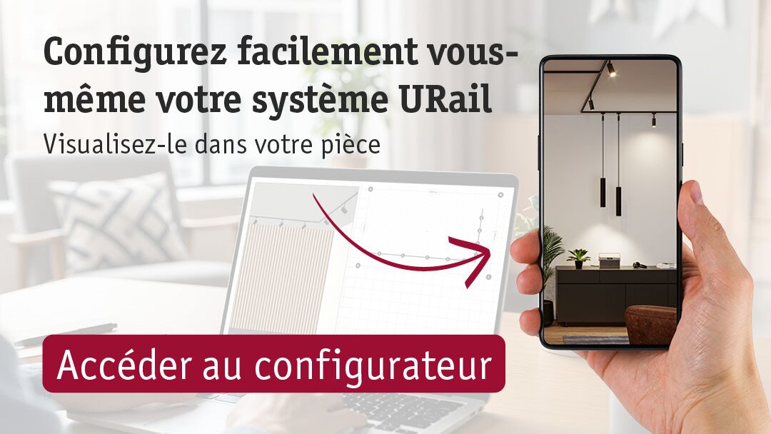 Main tenant un smartphone affichant un système URail noir avec suspensions, ordinateur portable avec configurateur URail