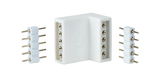 White plastic right-angle connector with metal pins for LED strip lighting, electrical connection.