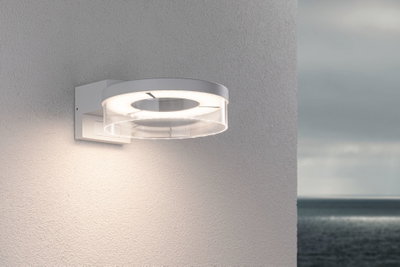 Modern white LED wall light with transparent diffuser for outdoor and garden lighting