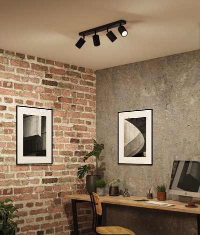Schwarze Deckenstrahler aus Metall mit vier verstellbaren Leuchten in modernem Arbeitszimmer mit Backsteinwand