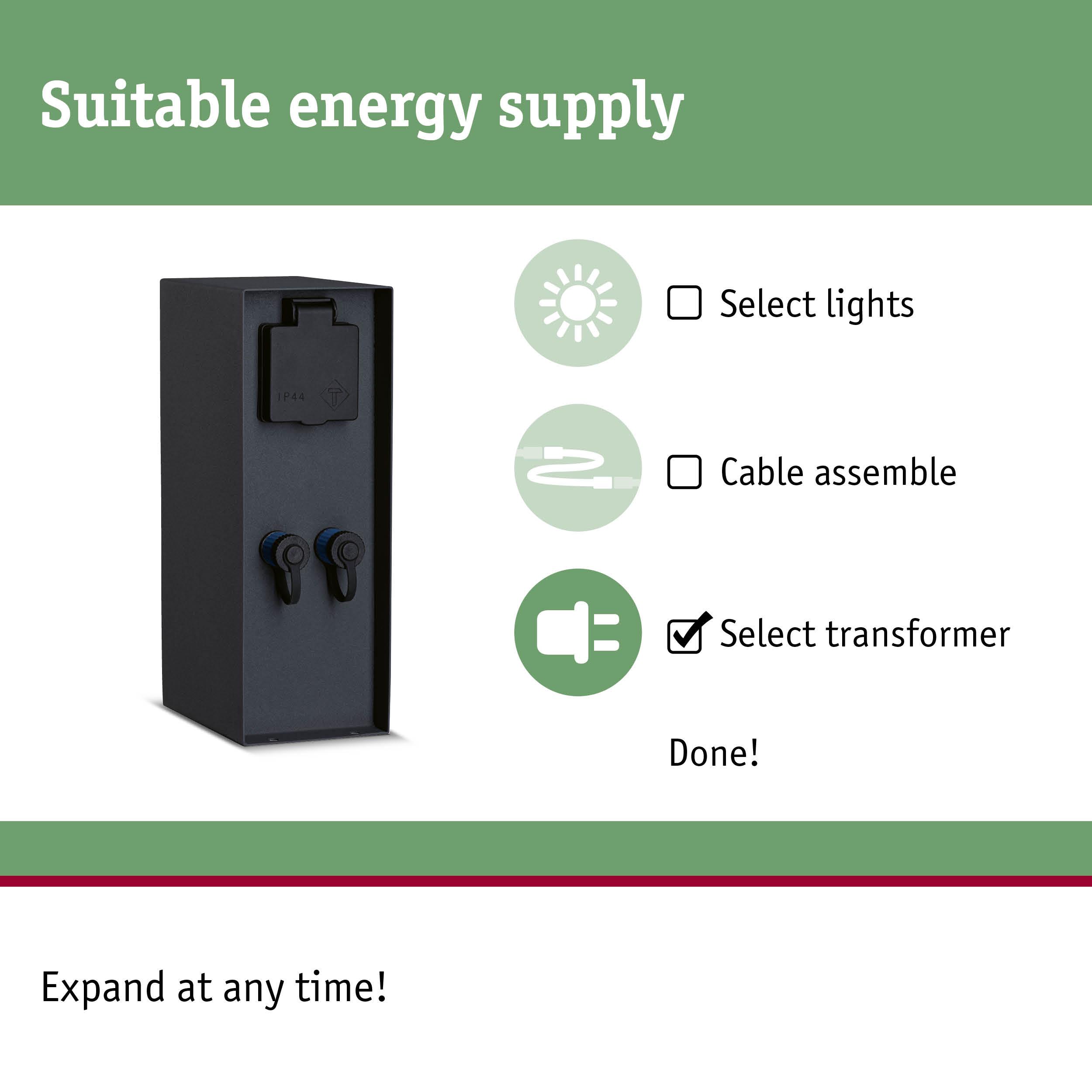 Black metal transformer with protective cover and connection terminals for lighting systems