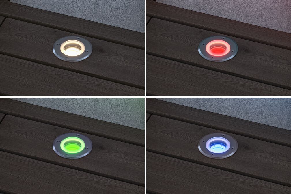 Vier verzonken metalen LED-vloerlampen met wisselende kleuren wit, rood, groen en blauw voor buiten.