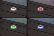 Four recessed metal LED floor lights with changing colors white, red, green, and blue for outdoor use.