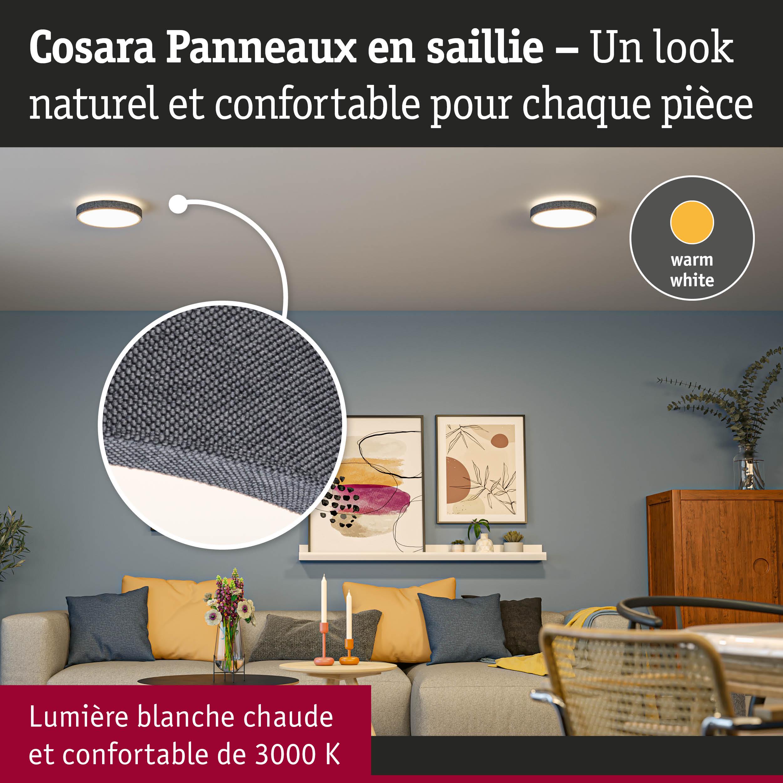 Salon avec plafonniers en tissu gris diffusant une lumière blanche chaude 3000K pour une ambiance naturelle