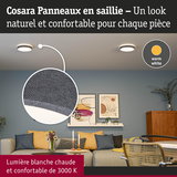 Salon avec plafonniers en tissu gris diffusant une lumière blanche chaude 3000K pour une ambiance naturelle