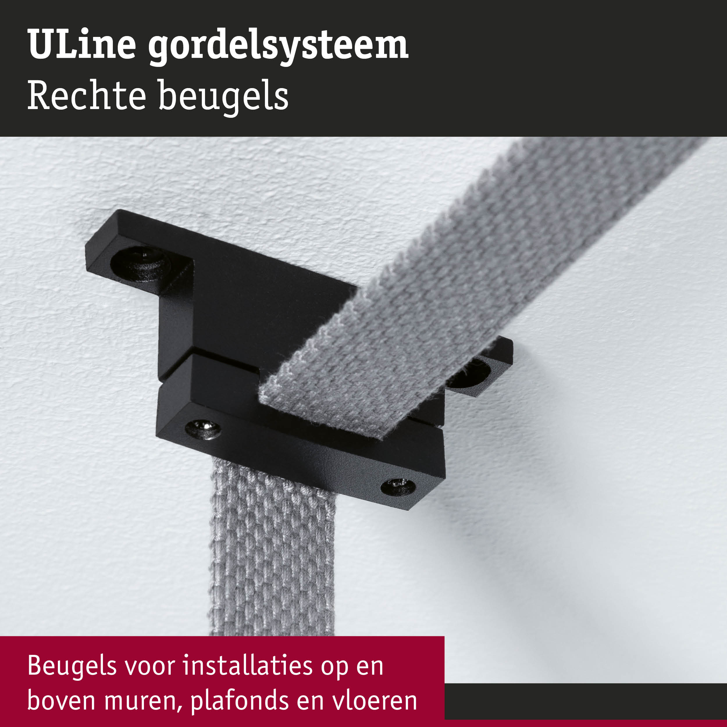 Zwart ULine gordelsysteem met rechthoekige beugel gemonteerd op witte muur voor gordijnmontage