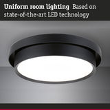Round black LED ceiling light providing uniform room lighting with advanced LED technology