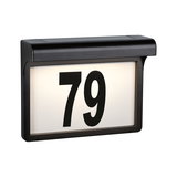 Black LED house number sign with illuminated white panel and black digits 79 for outdoor use