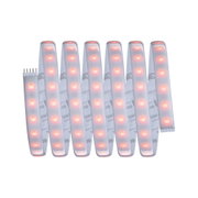 Flexible LED strip light with warm red LEDs and white base for decorative lighting solutions.