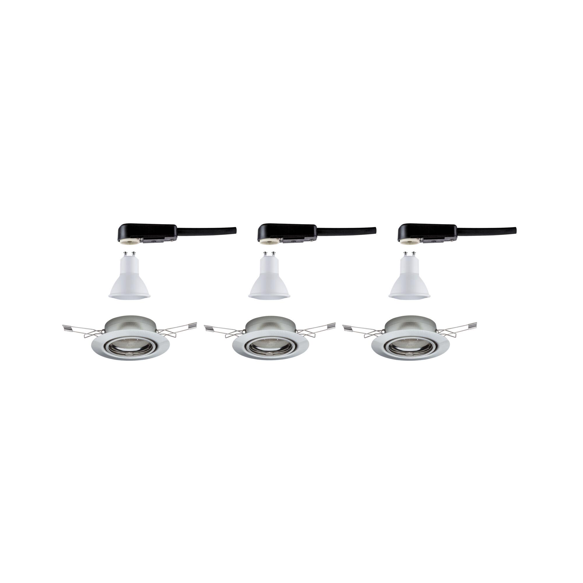 Trois ampoules LED GU10 blanches avec supports noirs et cadres encastrés argentés pour plafond
