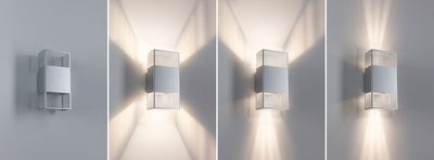 Modern silver aluminium wall light with grid design and adjustable light effects on white wall