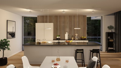 Modern white kitchen with wood panel wall and black bar stools, LED ceiling lights illuminating countertop