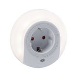 Round electrical socket with built-in night light in white and grey plastic for safe illumination