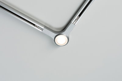 Modern silver LED ceiling spotlight with two arms and central light for living spaces