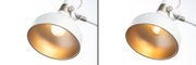 White metal wall lamp with gold interior featuring two different LED bulbs for lighting