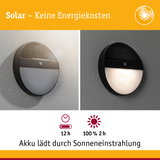 Runde schwarze Solar-Wandleuchte mit Bewegungsmelder, energiesparende Außenbeleuchtung mit Akku.