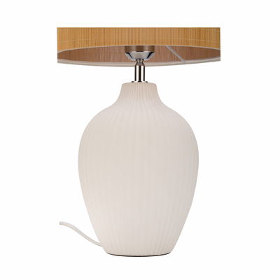 Table lamp with white ceramic base and brown fabric shade for elegant home lighting