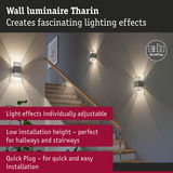 Tharin wall luminaire in grey metal with adjustable light effects ideal for hallways and stairways lighting