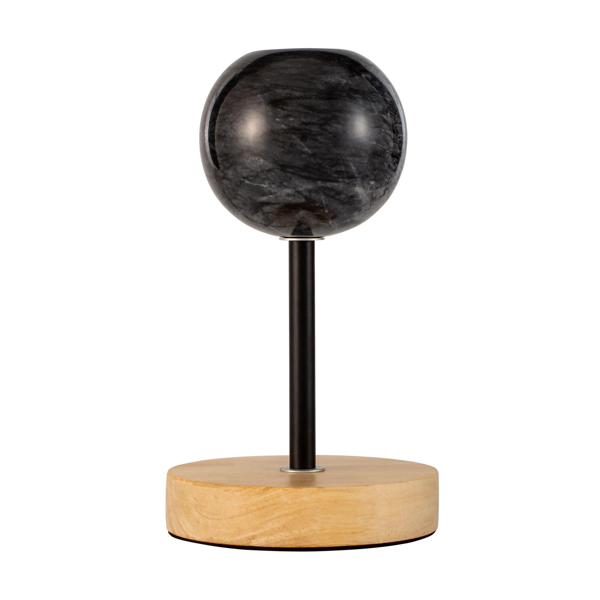 Modern table lamp with black marble globe shade and wooden base for stylish room lighting