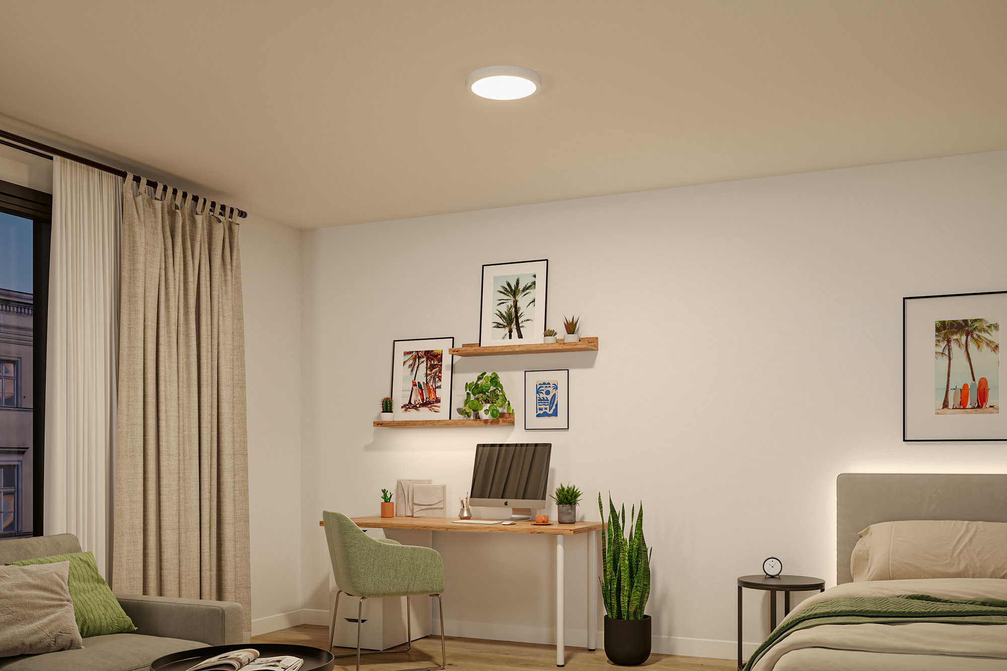 Rundes LED-Deckenlicht in Weiß in modernem Schlafzimmer mit Schreibtisch und grüner Deko