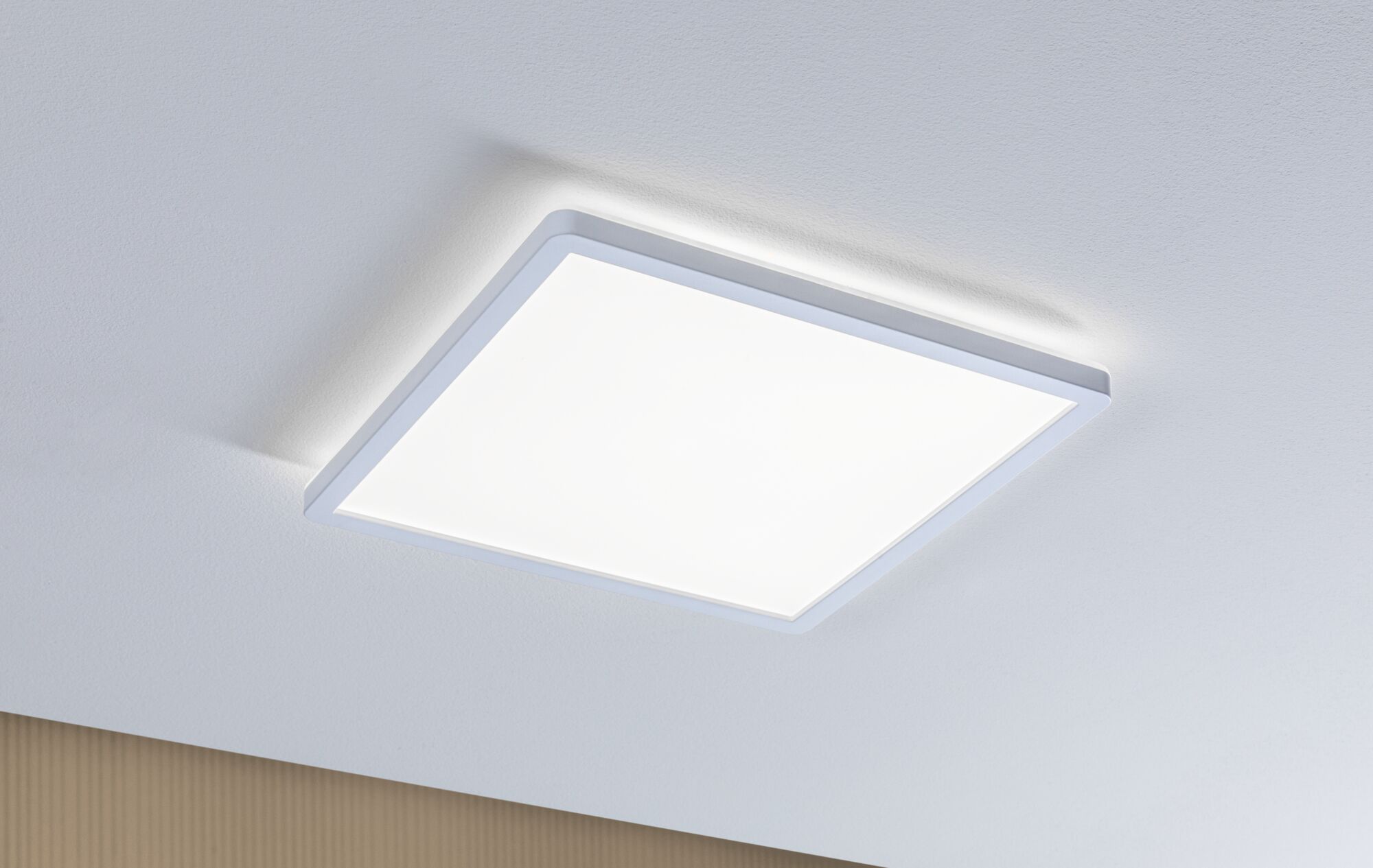 Modern square white LED ceiling light with energy-saving illumination for living spaces