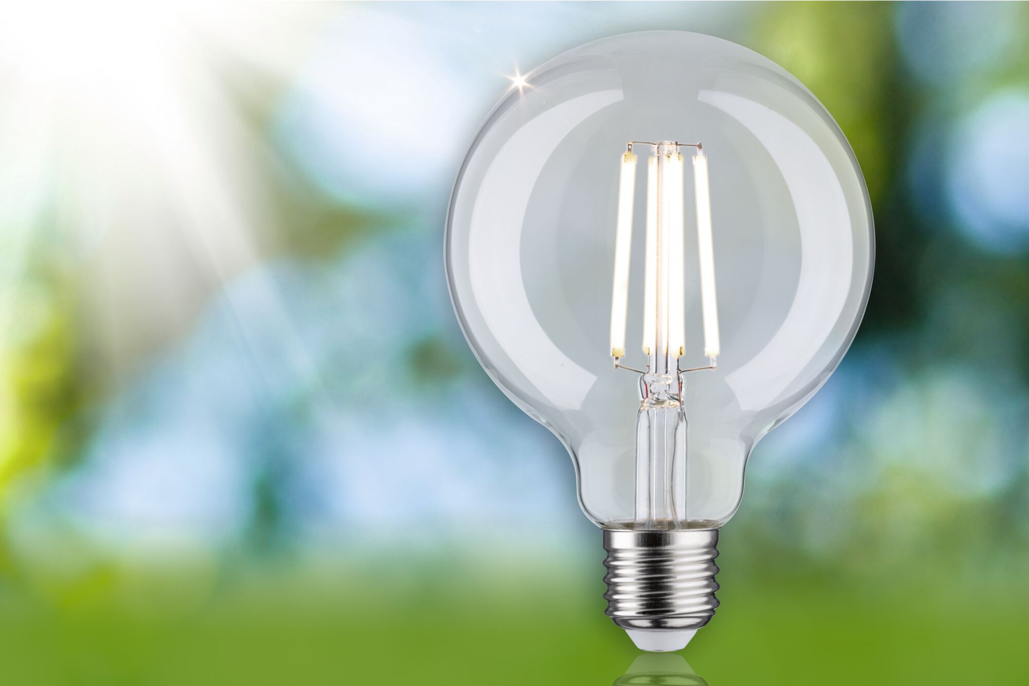Clear glass LED bulb with visible filaments and E27 base for energy-efficient lighting