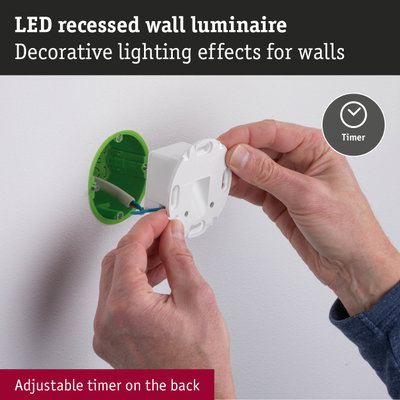 LED recessed wall luminaire with white plastic housing and green mounting box, adjustable timer on back